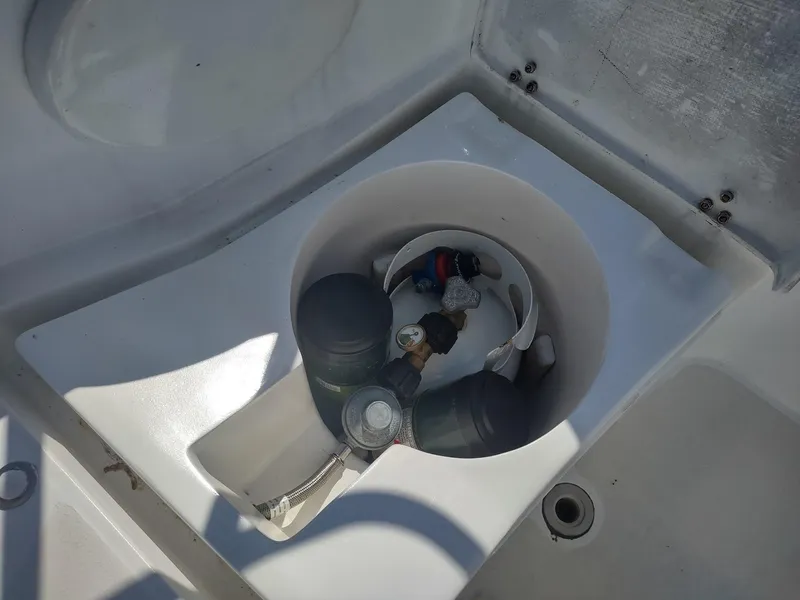 Slide: The Image of Propane tank storage compartment on a 1983 Islander 40 sailboat. - 20