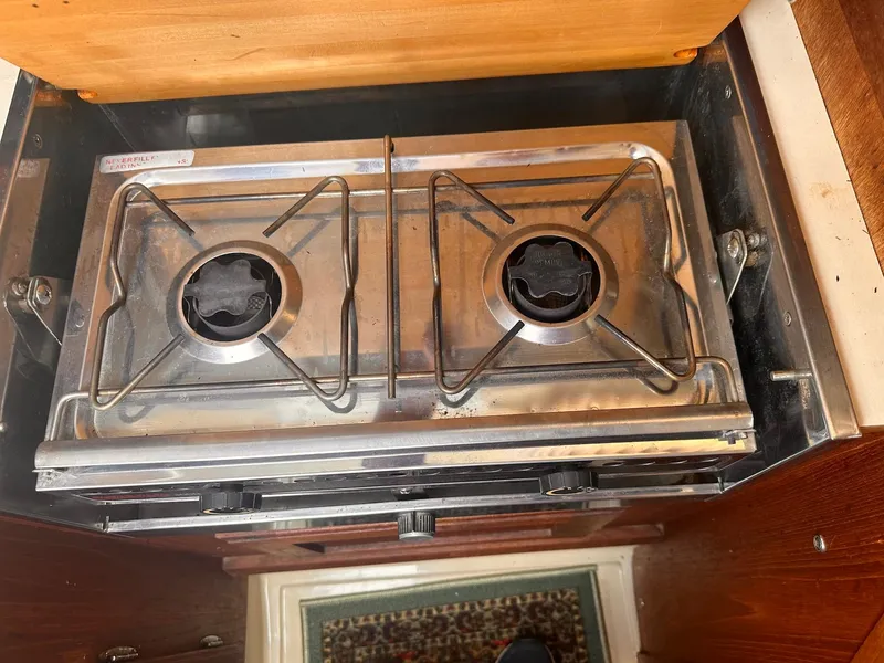 Slide: The Image of Stainless steel two-burner stove in 1983 O'Day 30 sailboat galley. - 12