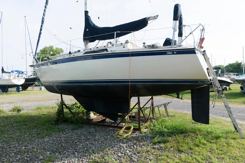 Slide: The Image of 1983 O'Day 30 sailboat on dry dock for maintenance. - 2