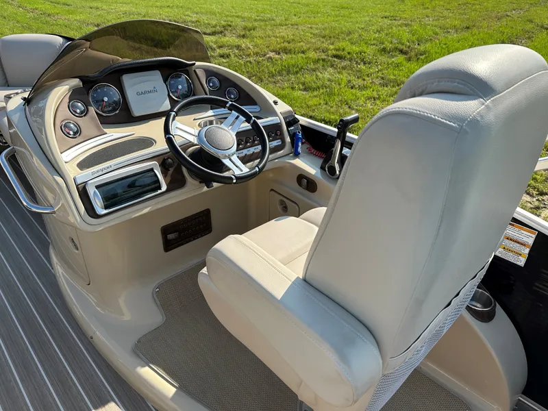 Slide: The Image of Interior view of 2014 Sanpan SP2200BC3 boat with steering console. - 12