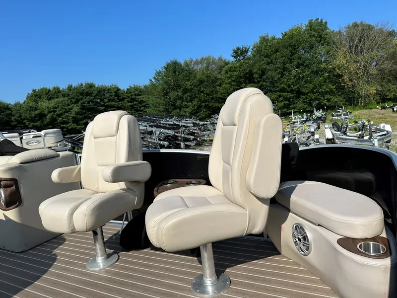 Slide: The Image of Sanpan SP2200BC3 2014 boat seats on deck with forest background. - 17