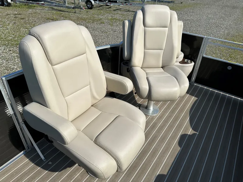 Slide: The Image of Sanpan SP2200BC3 2014 boat seats on striped deck. - 18