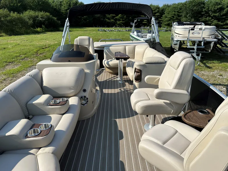Slide: The Image of Sanpan SP2200BC3 2014 pontoon boat with luxurious seating and cup holders. - 19