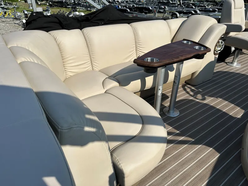 Slide: The Image of Sanpan SP2200BC3 2014 with beige leather sofa and wooden table. - 7