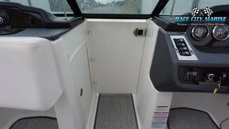 Slide: The Image of 2020 Chaparral 237 SSX boat interior dashboard and control panel. - 20