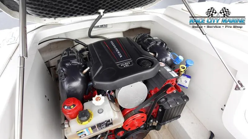 Slide: The Image of 2020 Chaparral 237 SSX boat engine compartment with MerCruiser 240 engine. - 21