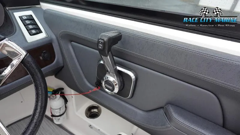 Slide: The Image of Control panel of a 2020 Chaparral 237 SSX boat with throttle lever. - 23