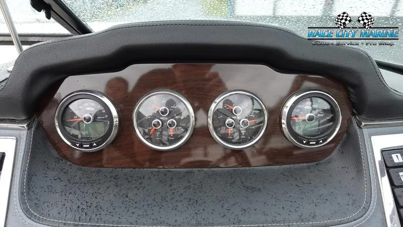 Slide: The Image of Dashboard of 2020 Chaparral 237 SSX boat with four analog gauges. - 39