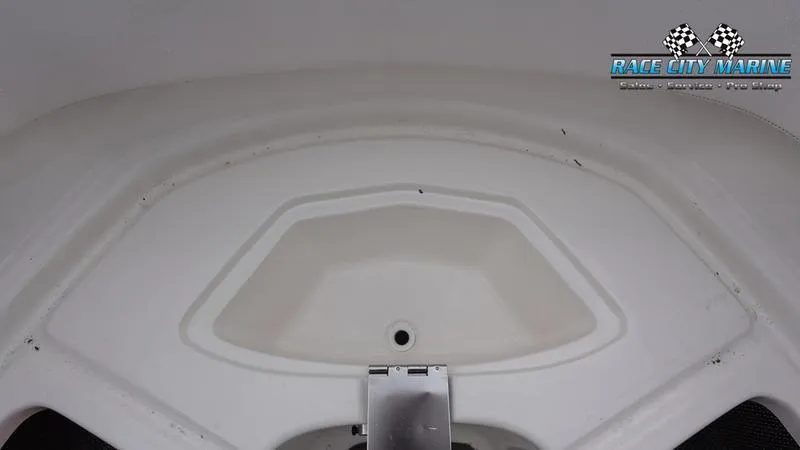 Slide: The Image of 2020 Chaparral 237 SSX boat interior with Race City Marine logo. - 8