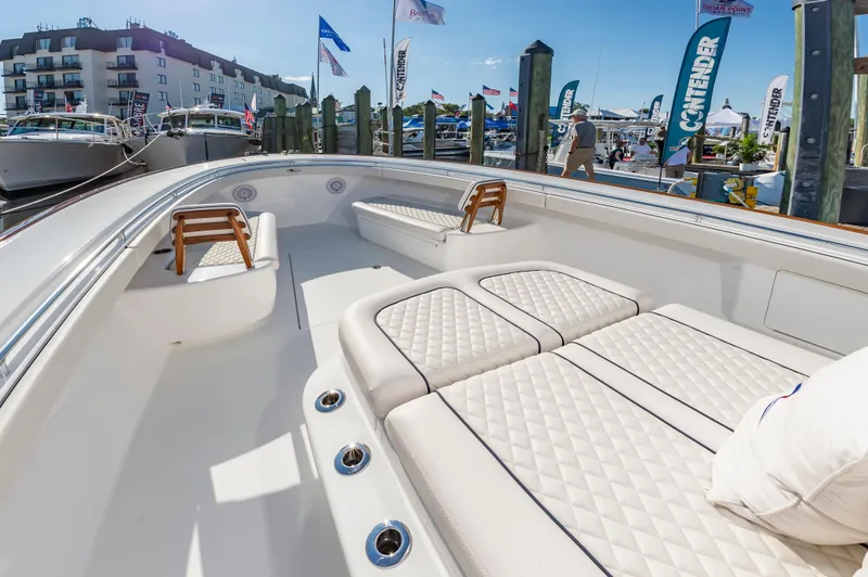 Slide: The Image of 2025 Valhalla Boatworks V-41 luxury seating at marina, showcasing elegant design and comfort. - 13