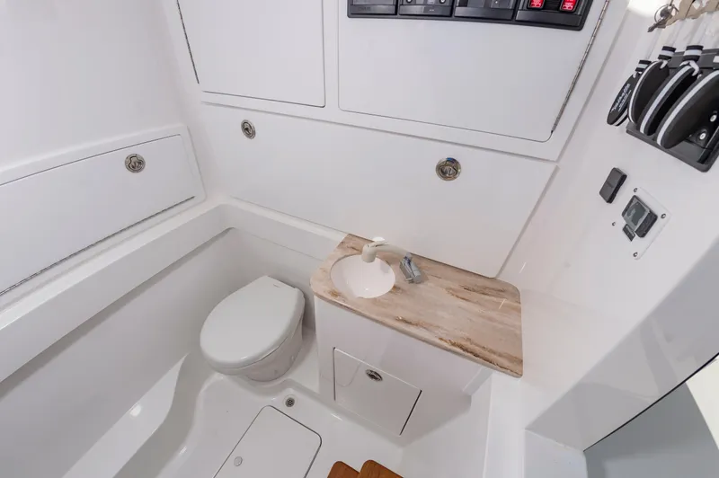 Slide: The Image of 2025 Valhalla Boatworks V-41 bathroom with modern fixtures and compact design. - 19