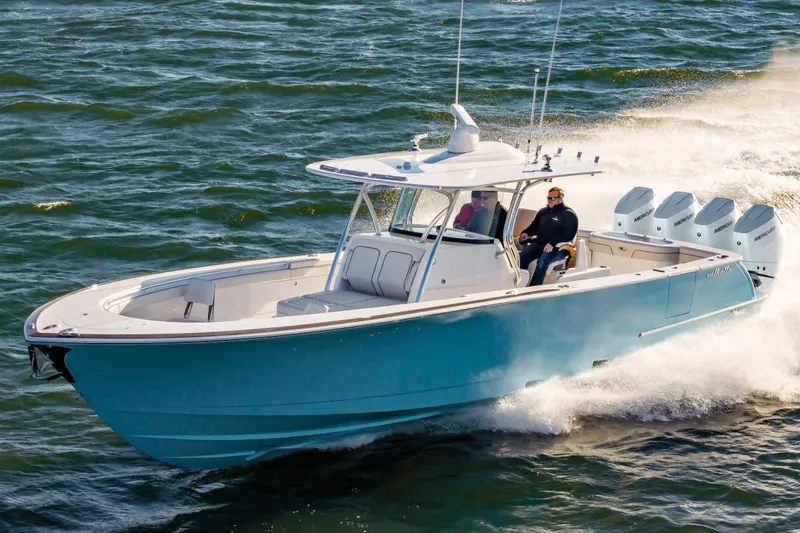 Slide: The Image of 2025 Valhalla Boatworks V-41 cruising on open water, showcasing sleek design and powerful engines. - 23