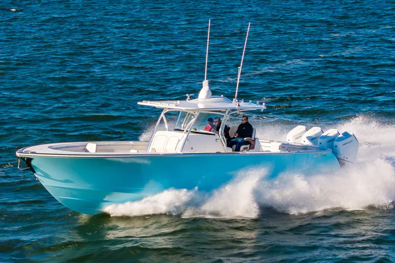 Slide: The Image of 2025 Valhalla Boatworks V-41 cruising on open water, showcasing sleek design and powerful engines. - 25