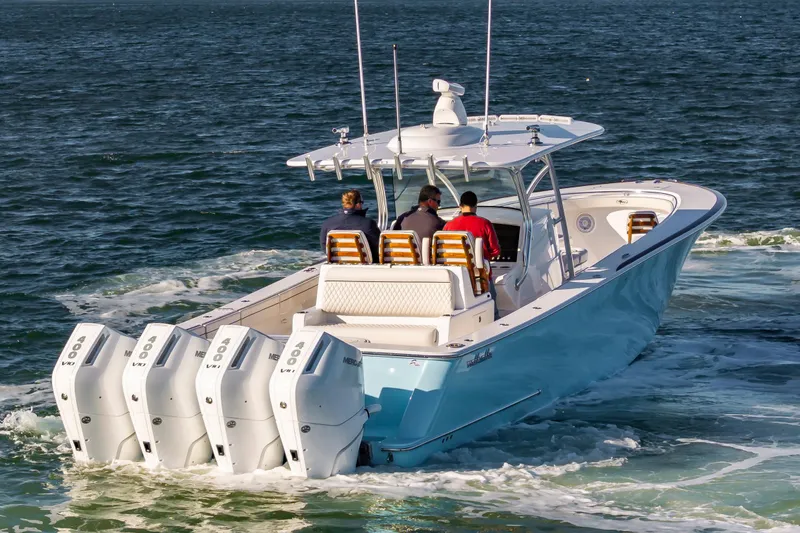 Slide: The Image of 2025 Valhalla Boatworks V-41 cruising on open water with four powerful engines. - 26