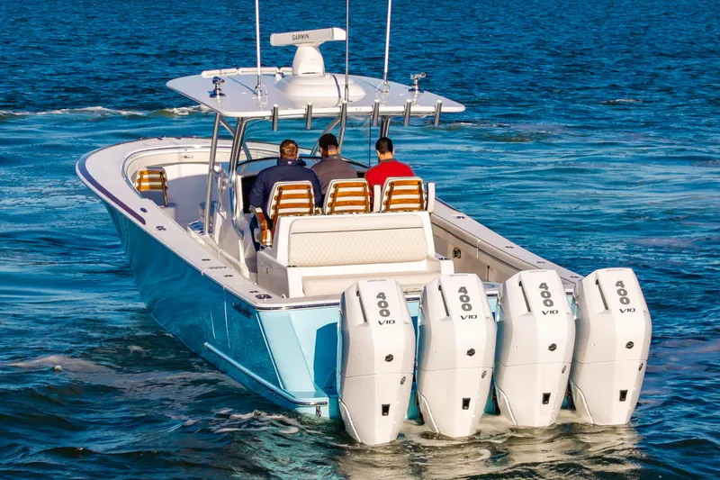 Slide: The Image of 2025 Valhalla Boatworks V-41 with quad engines cruising on open water. - 27