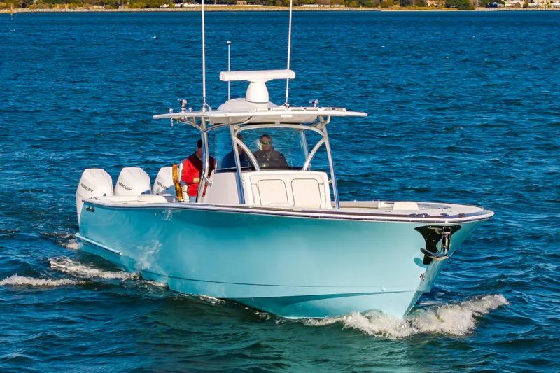 Slide: The Image of 2025 Valhalla Boatworks V-41 cruising on blue water, showcasing sleek design and powerful engines. - 29