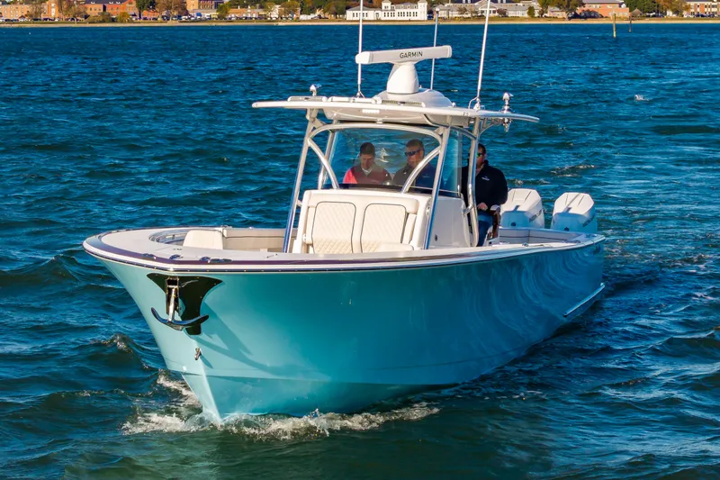 Slide: The Image of 2025 Valhalla Boatworks V-41 cruising on blue water, featuring sleek design and modern amenities. - 30