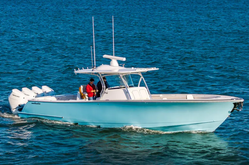 Slide: The Image of 2025 Valhalla Boatworks V-41 cruising on open water, featuring sleek design and powerful engines. - 31