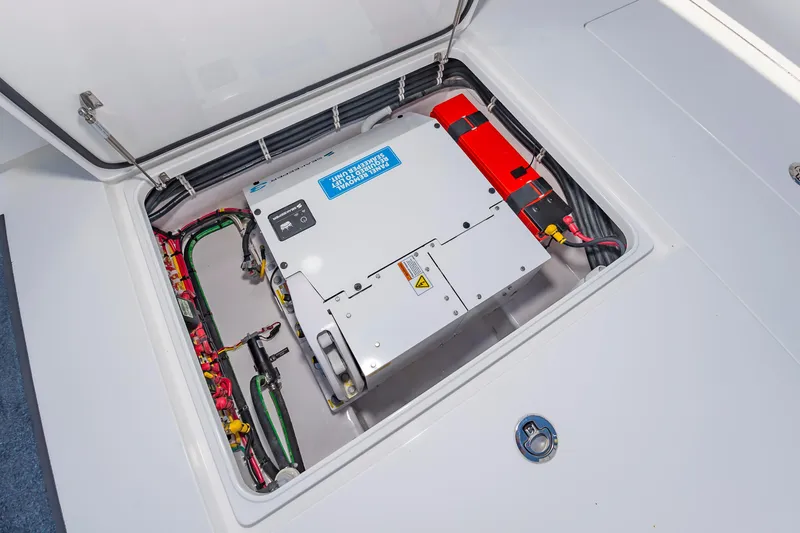 Slide: The Image of 2025 Valhalla Boatworks V-41 electrical compartment with wiring and components. - 9