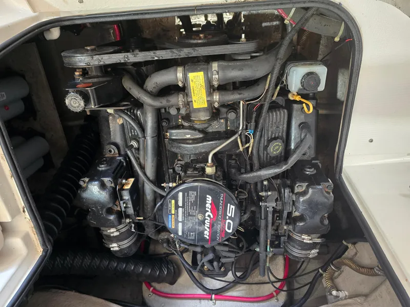 Slide: The Image of 1999 Regal Destiny 200 boat engine compartment with MerCruiser 5.0L engine. - 20