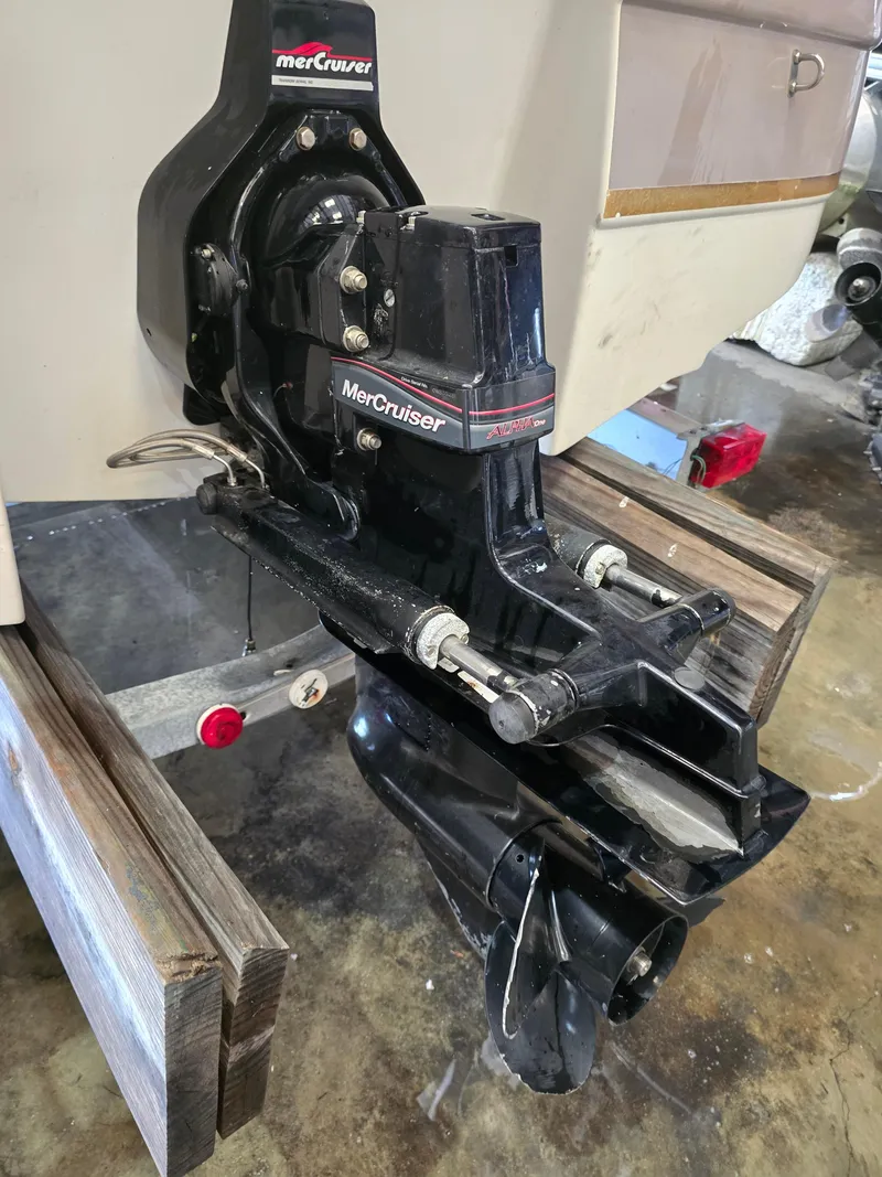 Slide: The Image of Close-up of a 1999 Regal Destiny 200 boat's MerCruiser Alpha One outdrive. - 21