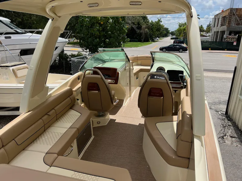 Slide: The Image of 2024 Chris-Craft Launch 25 GT boat interior with luxurious seating and modern design. - 6