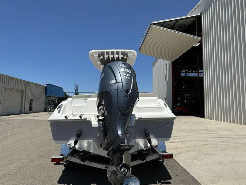 Slide: The Image of 2024 Key West 239 FS boat with Yamaha 300 V6 engine at a marina. - 3