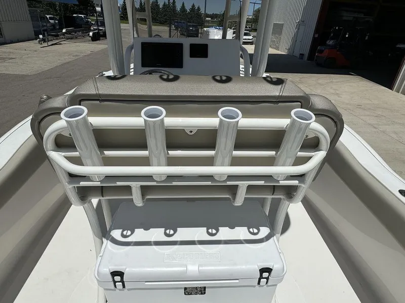 Slide: The Image of 2024 Key West 239 FS boat with rod holders and cooler. - 4