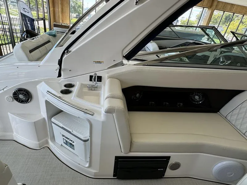 Slide: The Image of Luxurious interior of 2025 Regal 28X boat with seating and amenities. - 10
