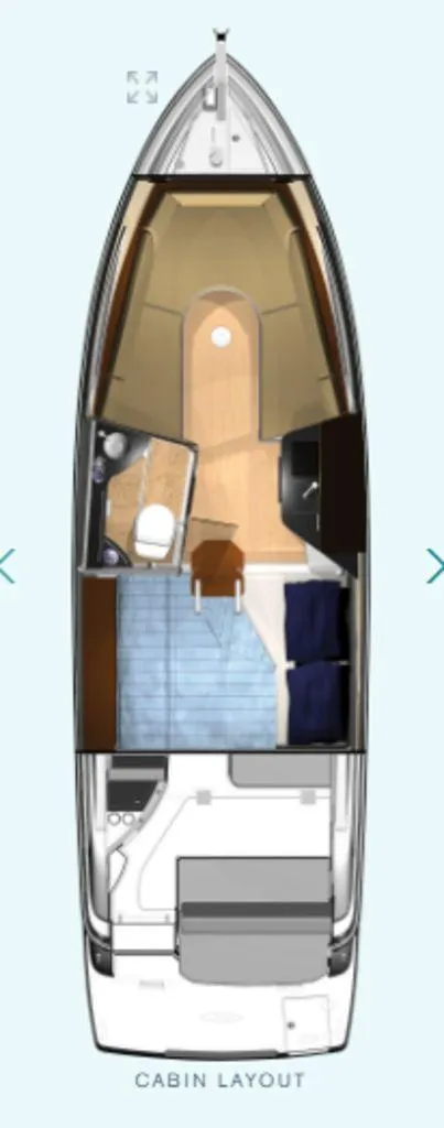 Slide: The Image of Regal 28X 2025 boat cabin layout with bed, bathroom, and kitchenette. - 15