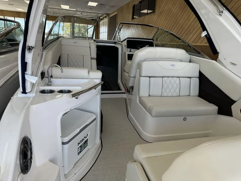 Slide: The Image of Luxurious interior of 2025 Regal 28X boat with plush seating and modern amenities. - 8