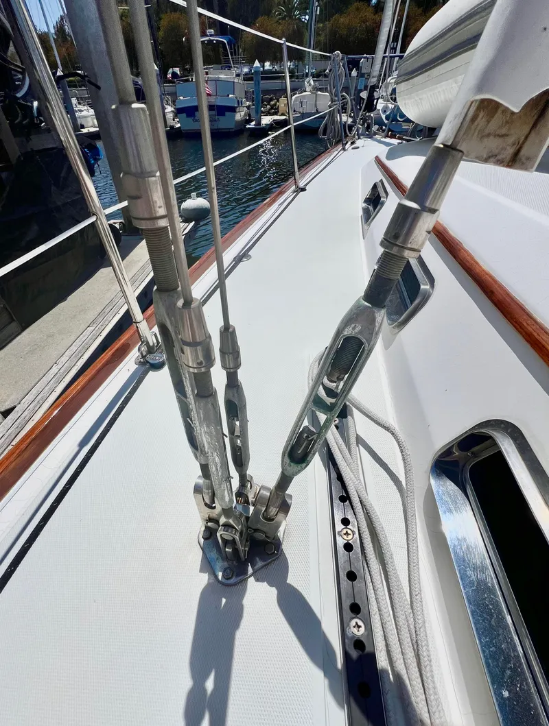 Slide: The Image of Close-up of rigging on a 1999 Sabre 402 sailboat docked at a marina. - 25