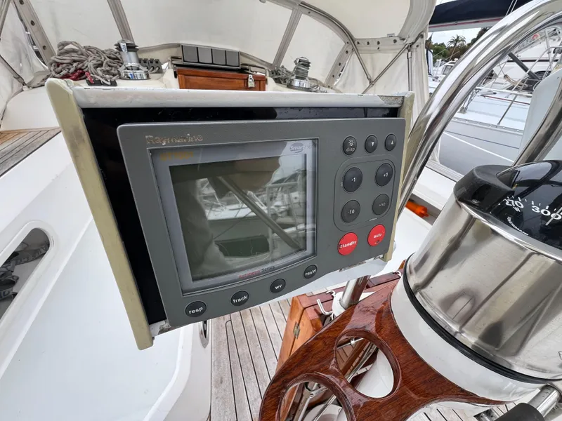 Slide: The Image of Sabre 402 sailboat cockpit with Raymarine navigation system, 1999 model. - 41