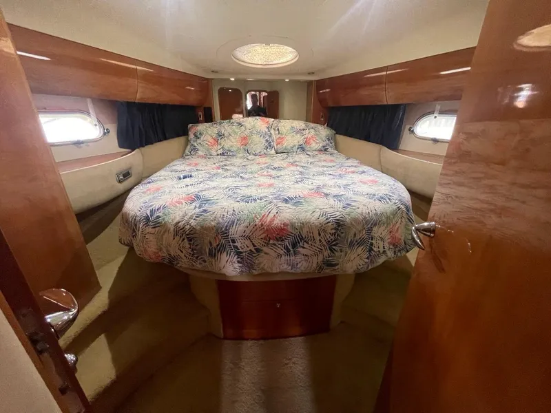 Slide: The Image of Luxurious bedroom in 2001 Viking Princess 45 Flybridge Sport Cruiser yacht. - 10
