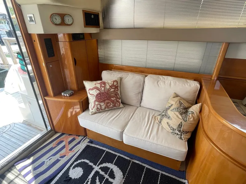 Slide: The Image of Interior of 2001 Viking Princess 45 Flybridge Sport Cruiser with cozy seating area. - 18