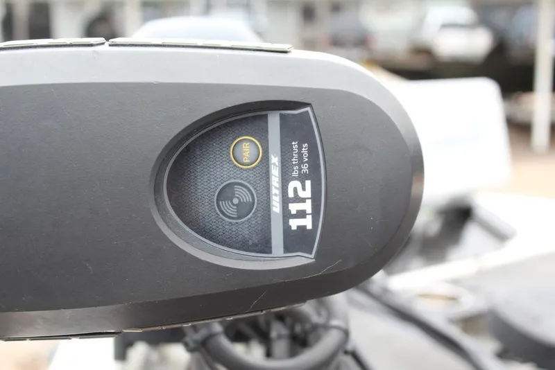 Slide: The Image of Close-up of a 2018 Ranger Z520C boat motor displaying 112 thrust. - 16