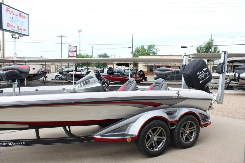 Slide: The Image of 2018 Ranger Z520C bass boat on a trailer at a dealership. - 5