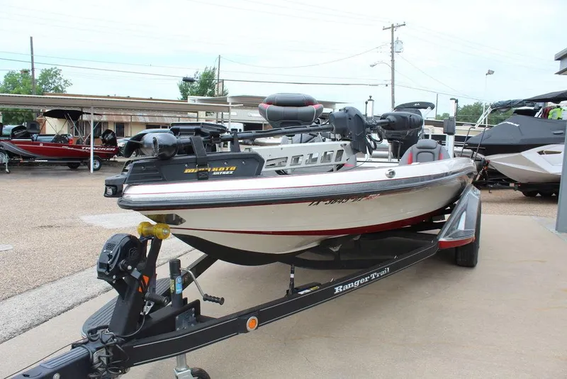 Slide: The Image of 2018 Ranger Z520C fishing boat on a trailer in a marina. - 9