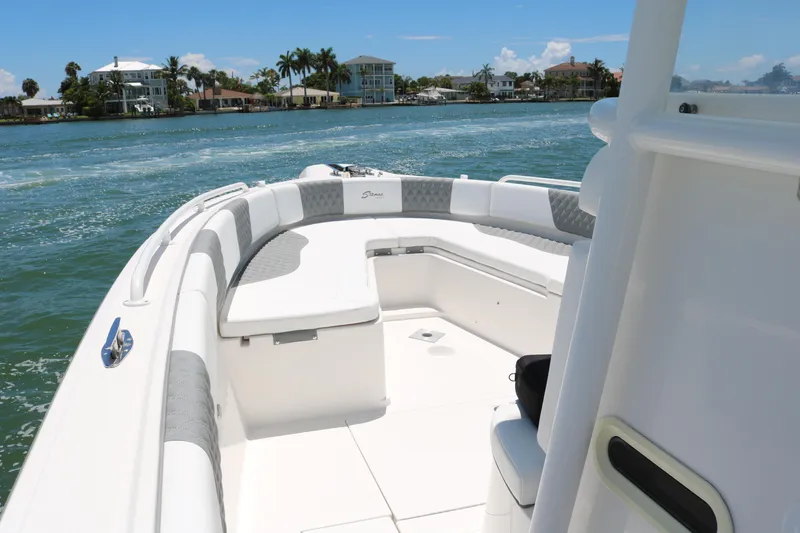 Slide: The Image of 2016 Stamas 317 Tarpon boat with spacious seating on a sunny day. - 24