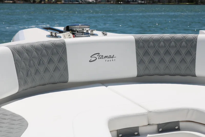 Slide: The Image of 2016 Stamas 317 Tarpon yacht interior with grey and white seating. - 26