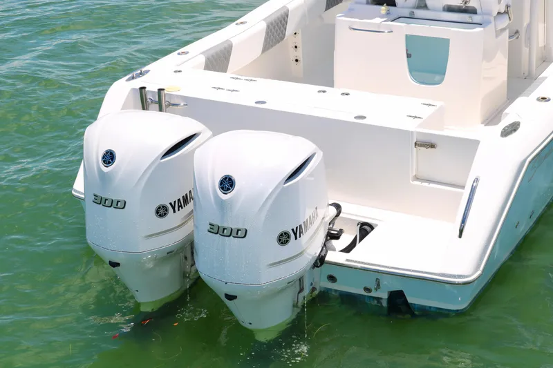 Slide: The Image of 2016 Stamas 317 Tarpon with twin Yamaha 300 outboard engines in water. - 7