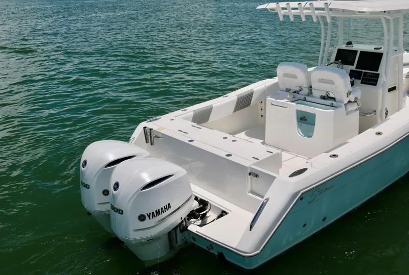 Slide: The Image of 2016 Stamas 317 Tarpon boat with twin Yamaha outboard engines on water. - 8