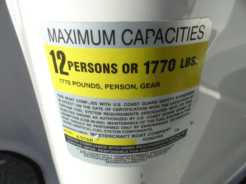 Slide: The Image of 2007 MasterCraft X-Star maximum capacity label: 12 persons or 1770 lbs. - 14