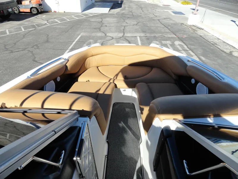 Slide: The Image of 2007 MasterCraft X-Star boat with tan leather seating in the bow area. - 17