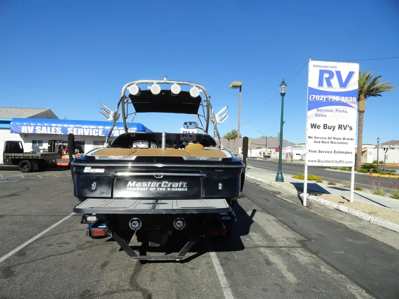 Slide: The Image of 2007 MasterCraft X-Star boat at RV sales lot on a sunny day. - 22