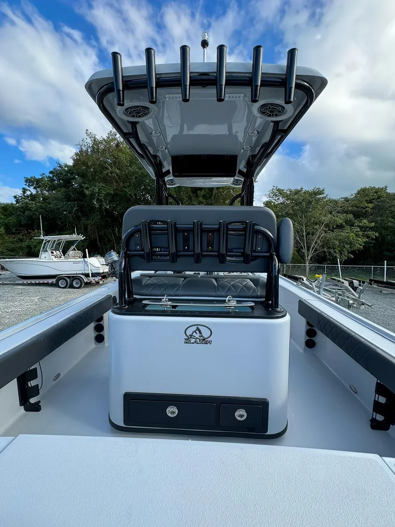 Slide: The Image of 2025 Blazer 2700 HYBRID BAY boat, sleek design, spacious deck, modern features. - 14