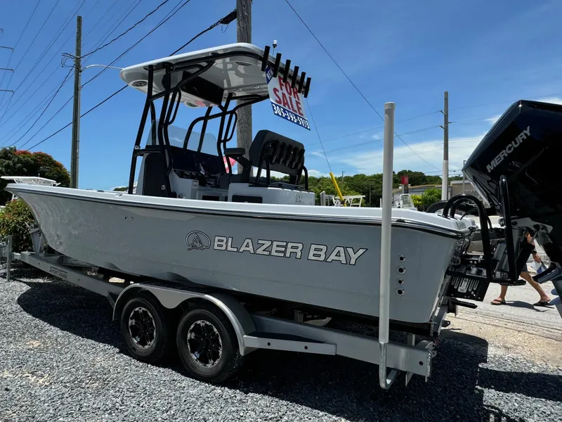 Slide: The Image of 2025 Blazer 2700 HYBRID BAY boat on trailer, for sale, outdoor display. - 15