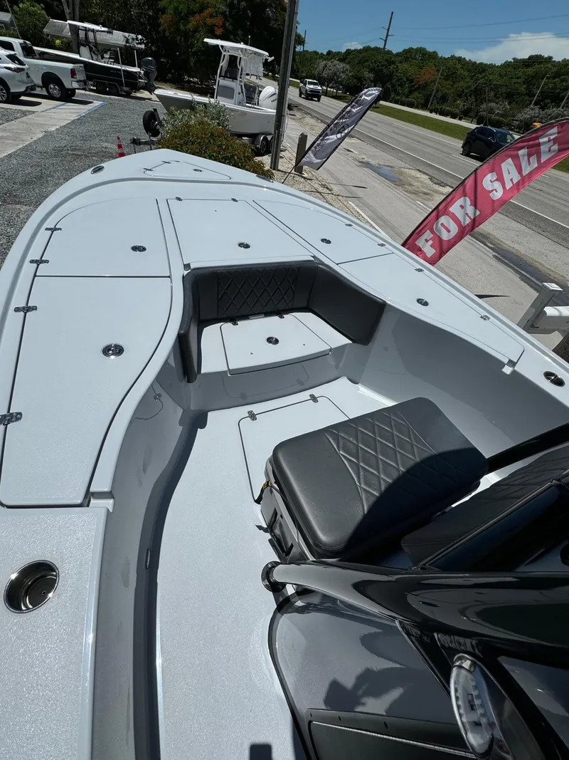 Slide: The Image of 2025 Blazer 2700 HYBRID BAY boat for sale, front deck view. - 4