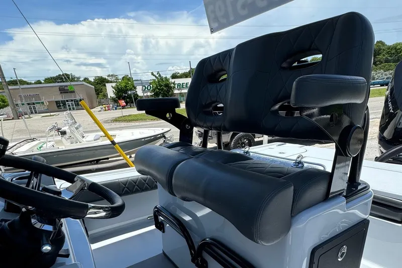 Slide: The Image of 2025 Blazer 2700 HYBRID BAY boat with dual black cushioned seats. - 7