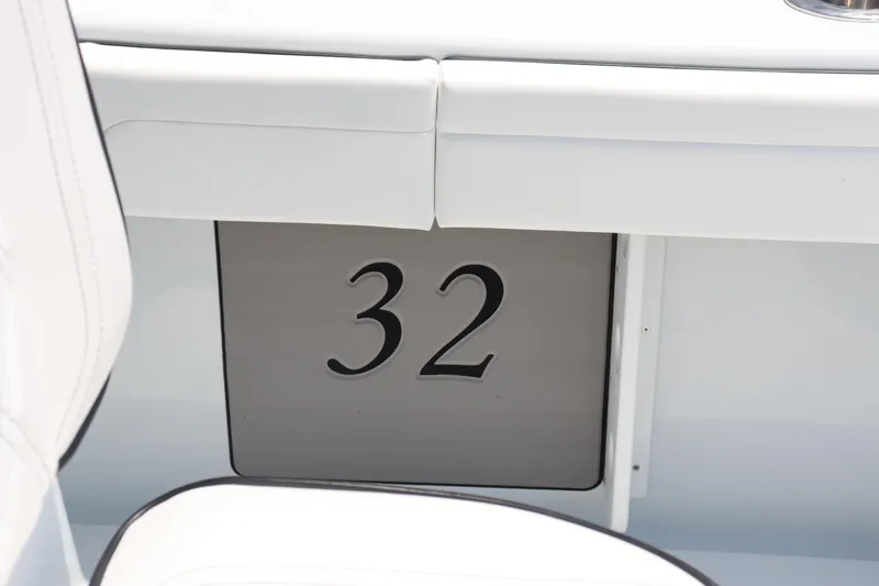 Slide: The Image of Yellowfin 32 Offshore 2025 boat interior detail with number 32. - 19